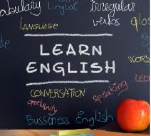 Picture of chalkboard that reads "learn English"