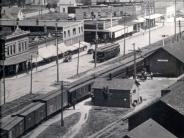Arial photograph showing Front Street, Henderson's shop, opera house and all the train station buildings including the trolley