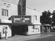 Pix Theater, 1957, front of building with large PIX sign and advertisement for Grapes of Wrath